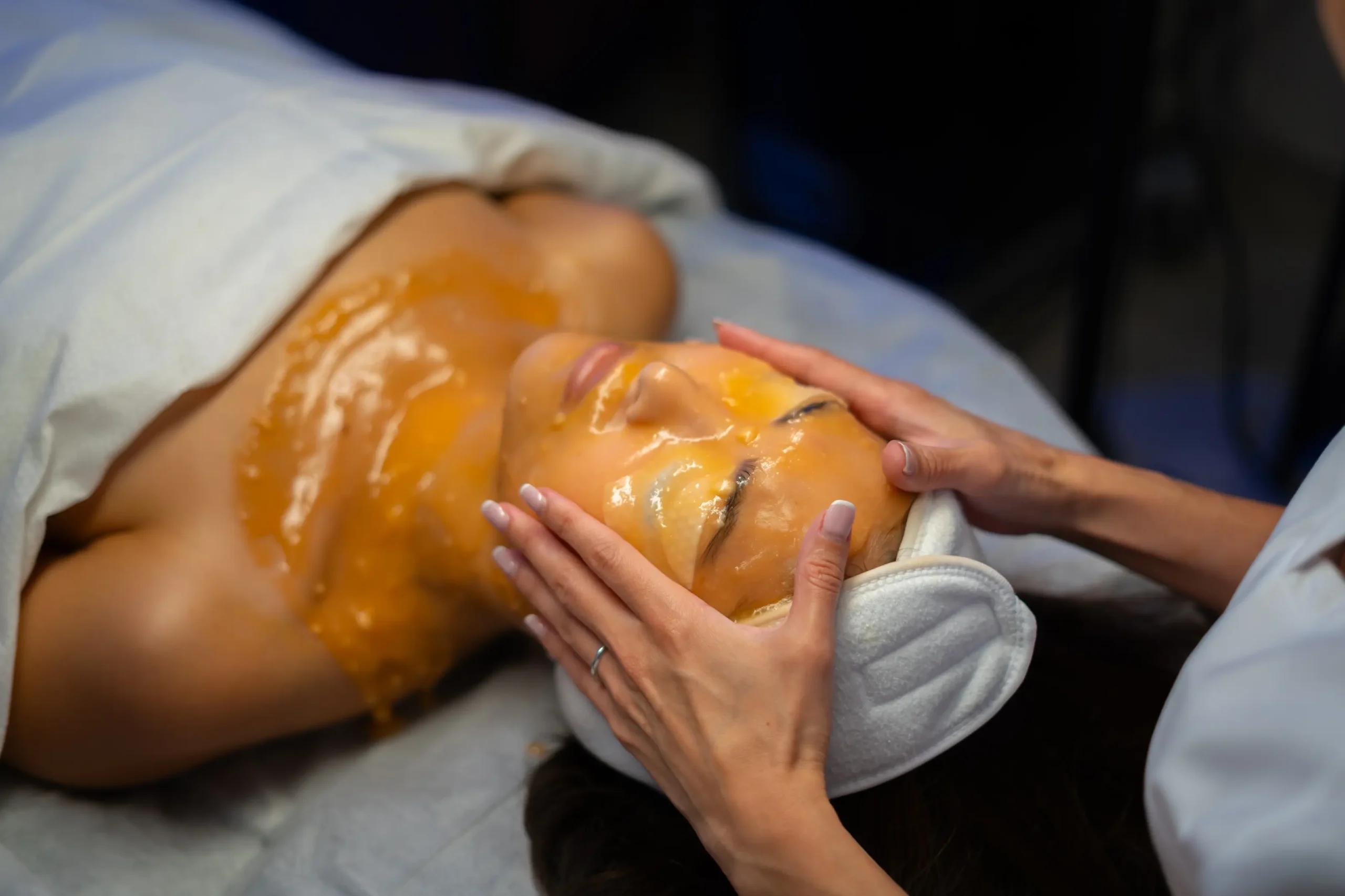Brightening exfoliation treatment on face and décolleté at AryNova Aesthetics