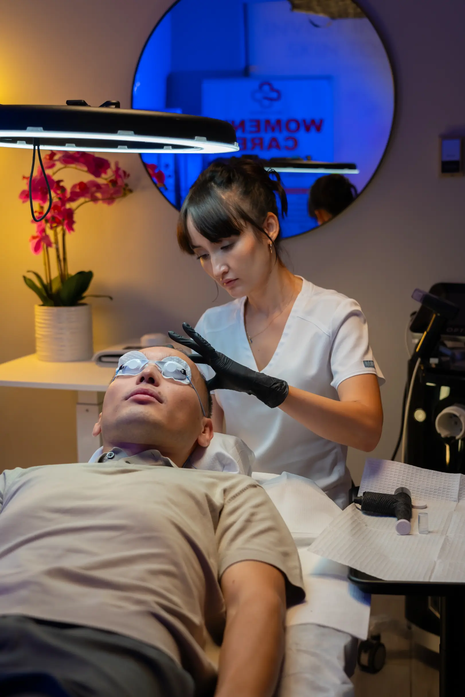 Aesthetician performing scalp injections for hair restoration at AryNova Aesthetics Mount Prospect